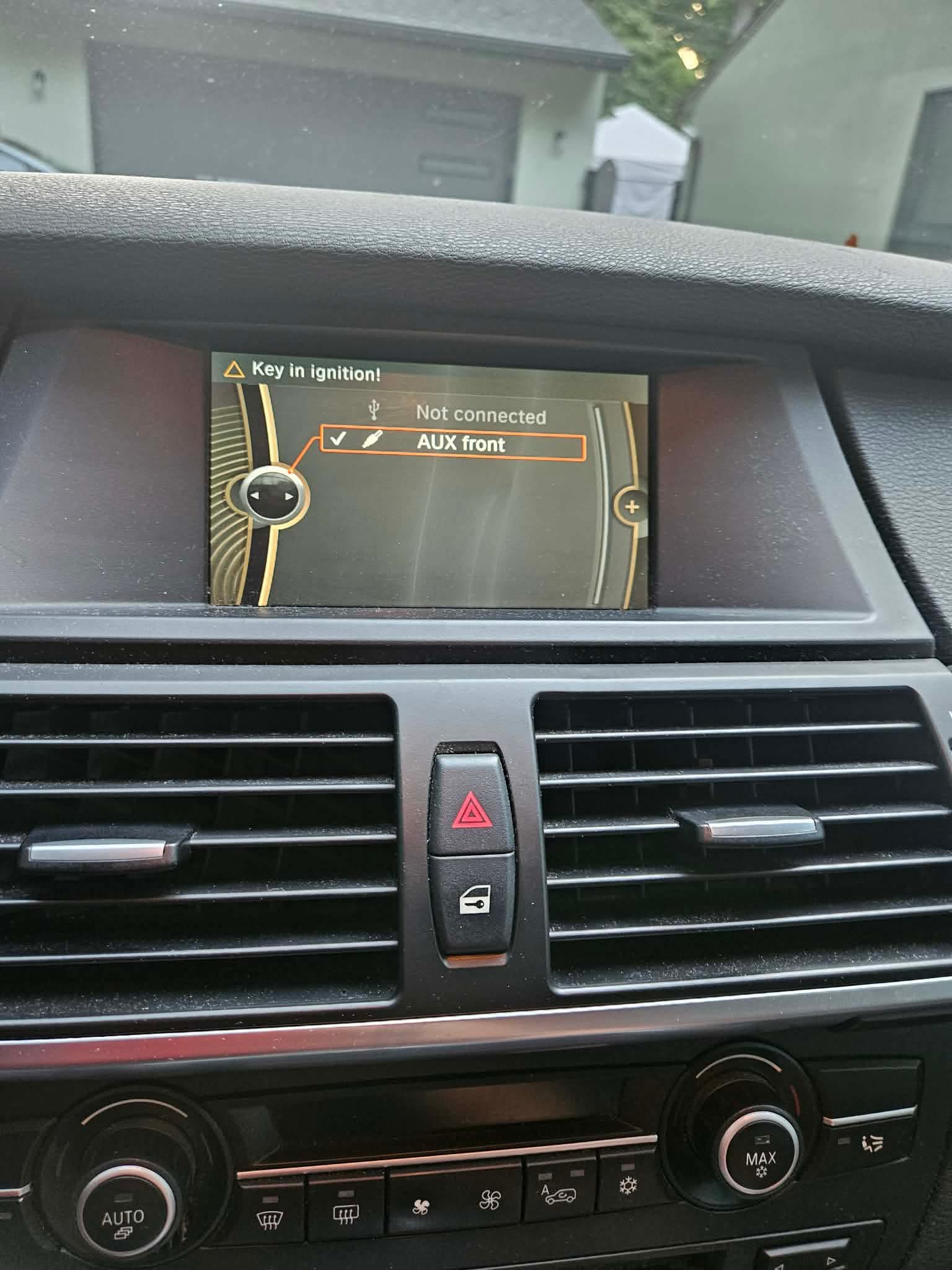 2009 BMW X5 E70 before installation, with the smaller original screen