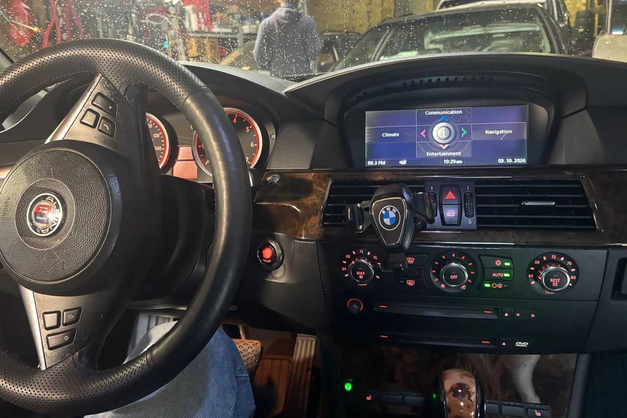 2007 BMW 550i E60 from the driver's seat before the upgrade, with the original BMW CCC screen