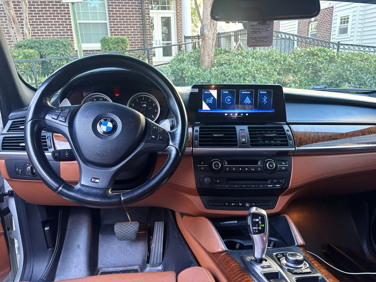The same X6 M after installation, with the new widescreen touchscreen